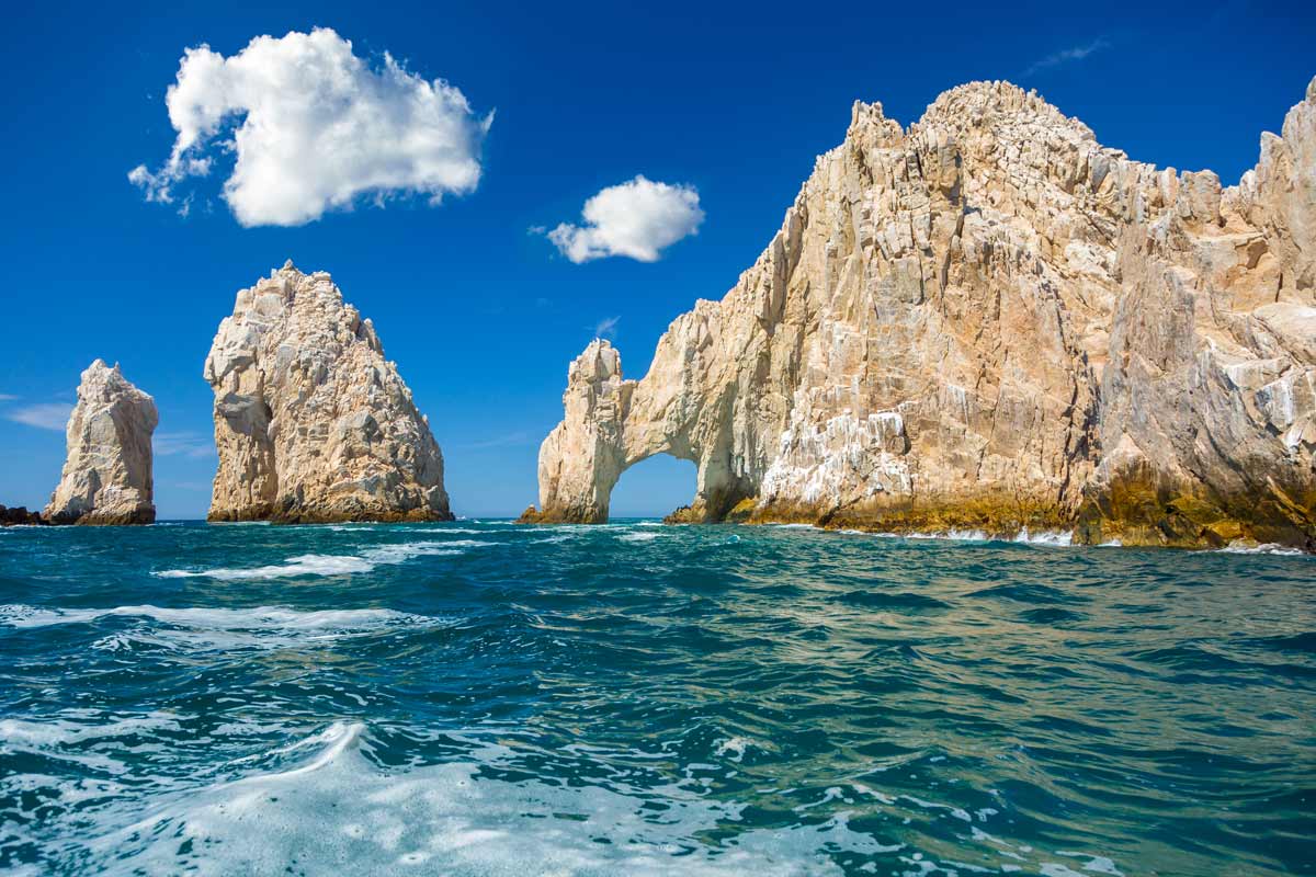 stand up paddle boarding the arch Cabo San Lucas Mexico